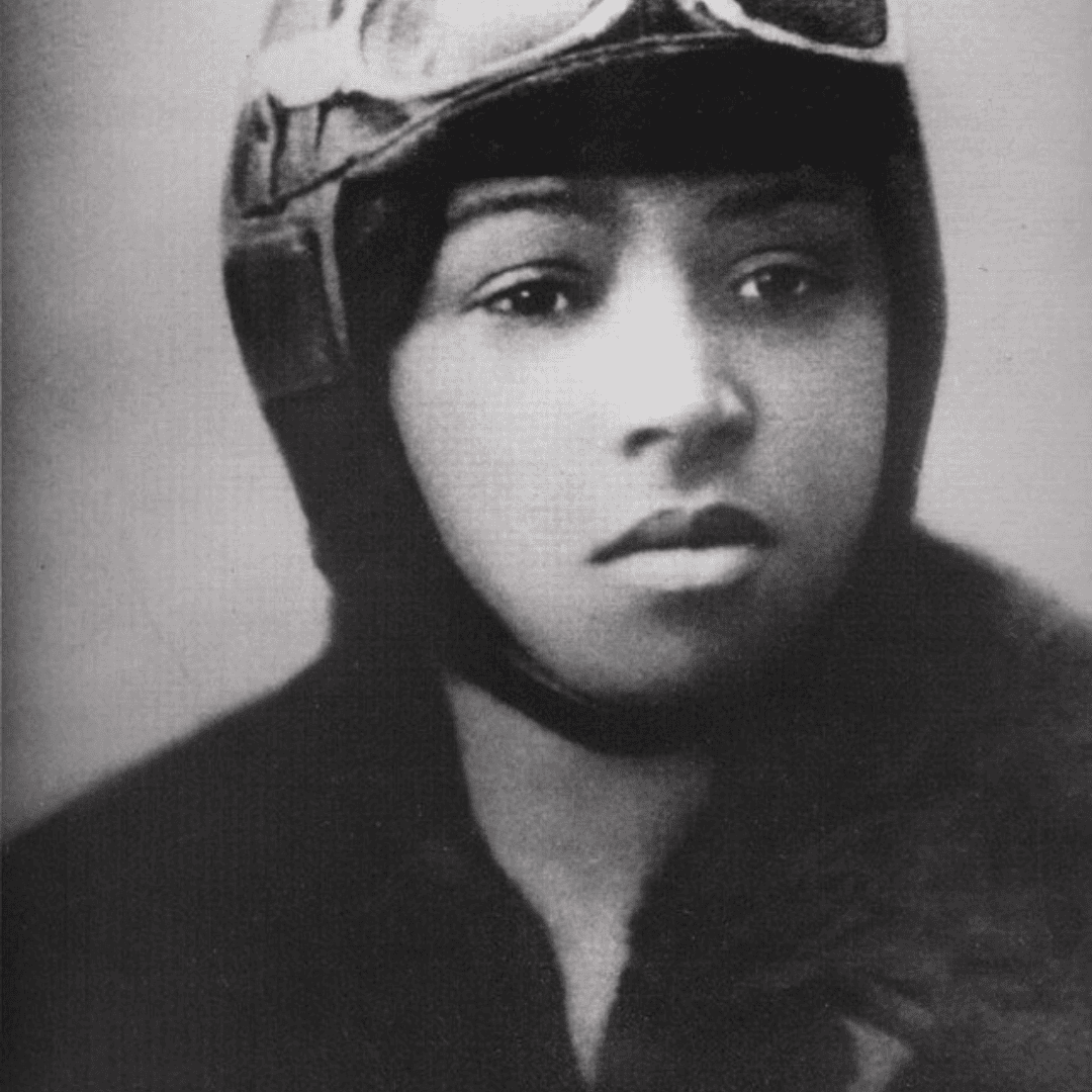 a black and white image of Bessie Coleman who was the first black woman to earn a license.